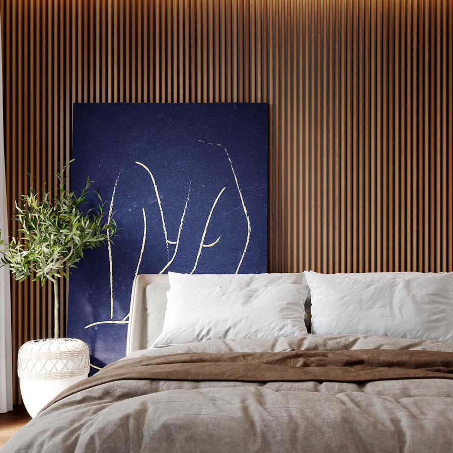 olive tree in the interior next to the bed